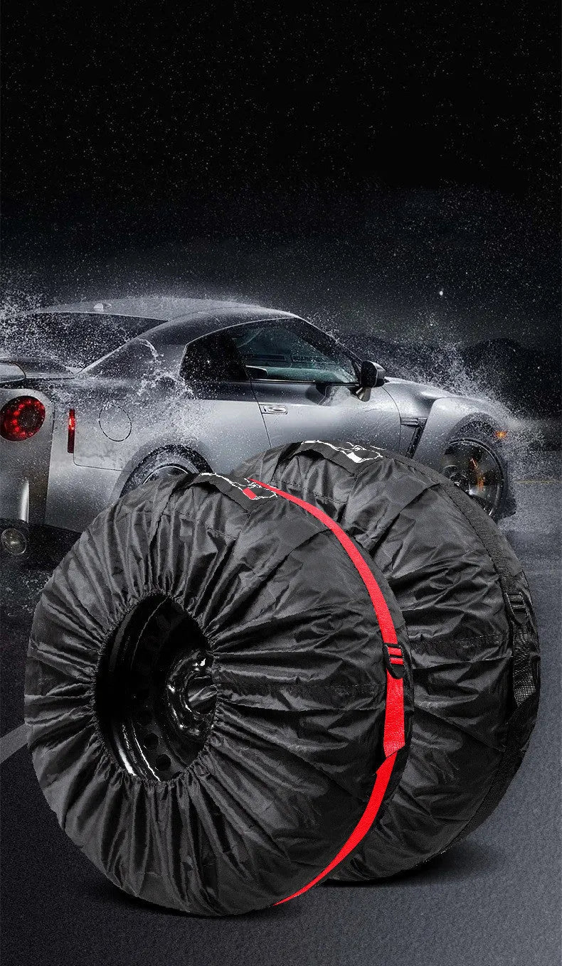 Set of four black Oxford cloth car tyre protective covers laid flat
