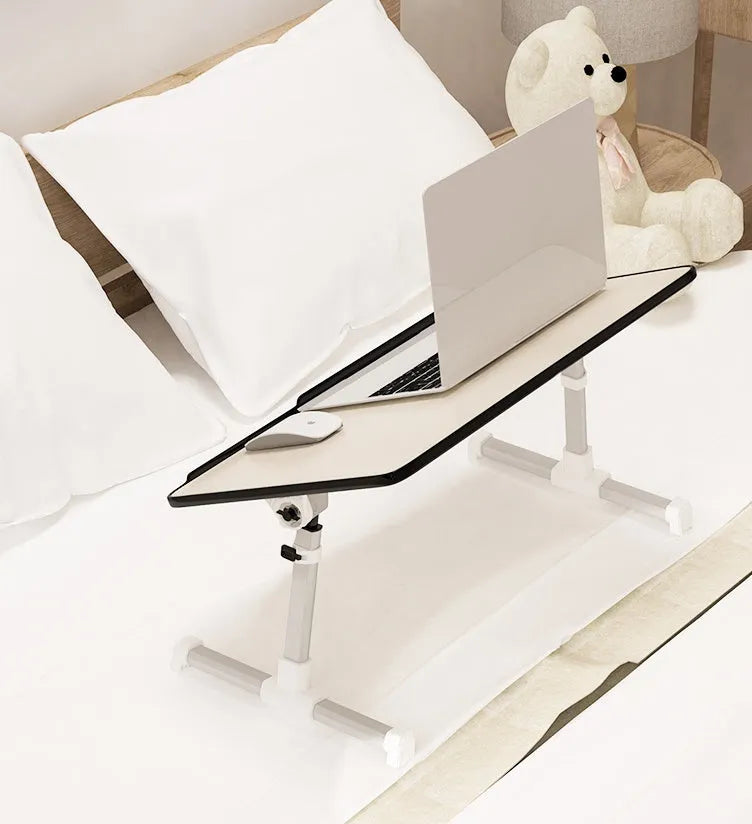 Adjustable laptop desk stand with wood-based panel, folded flat on a surface, 52x30 cm black colour