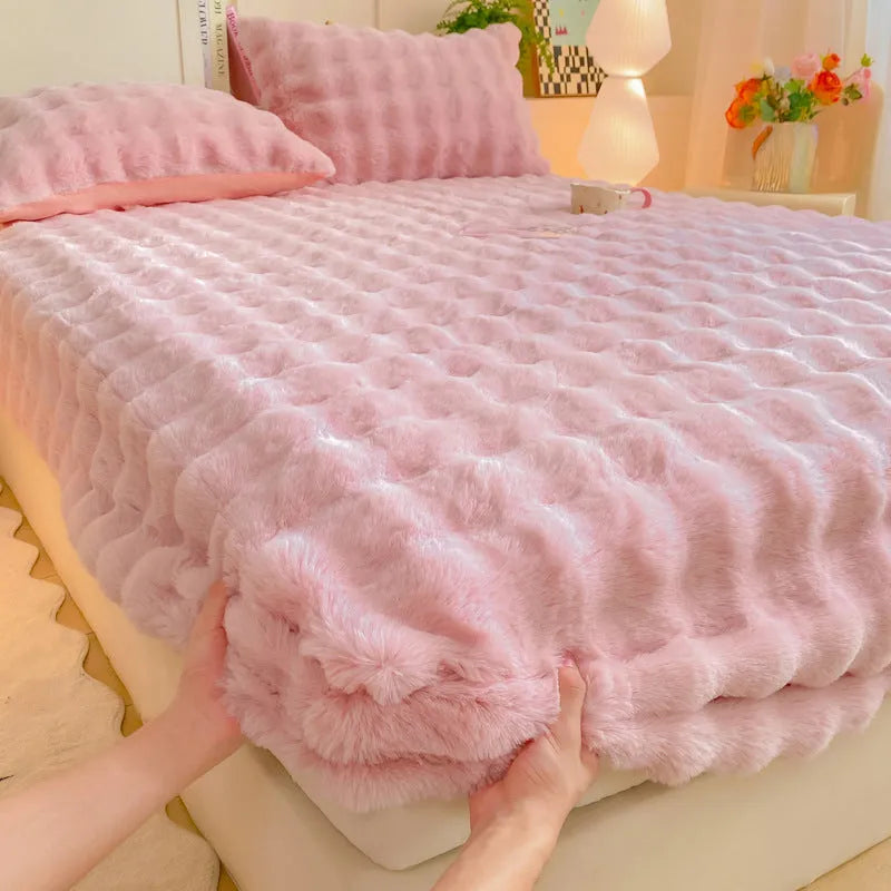 Class A milk fiber fitted sheet with rabbit plush in clear blue, showing elastic edges and smooth surface