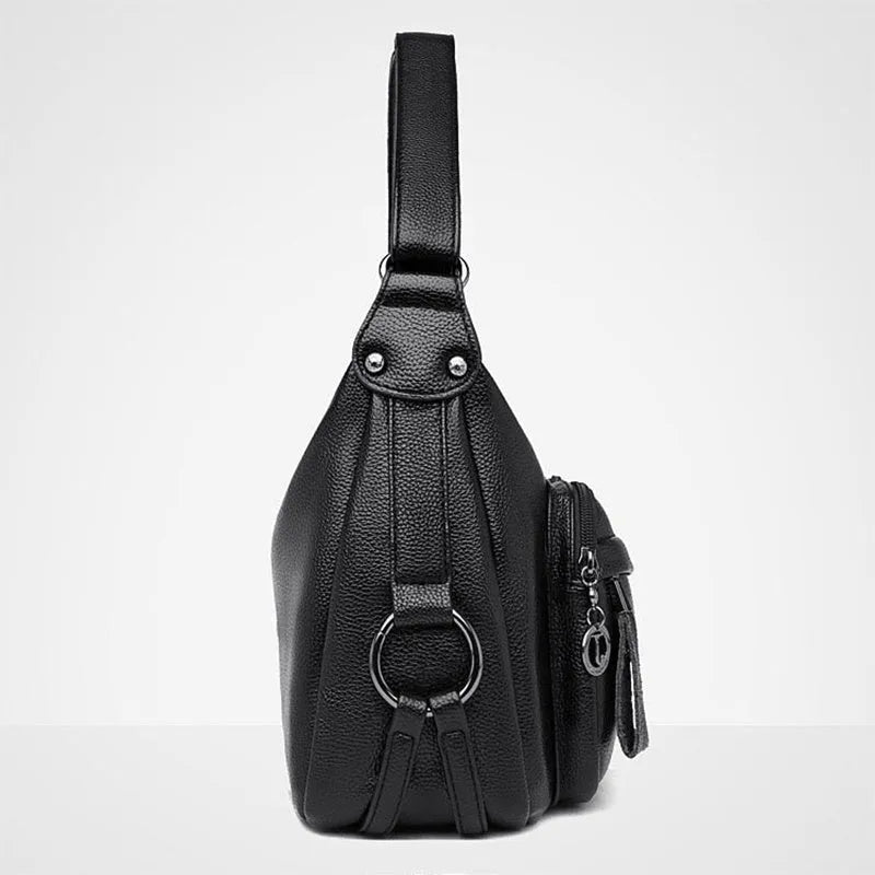 Large black women's crossbody shoulder bag with multiple internal compartments and zip closure