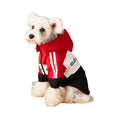 Dog wearing a waterproof polyester raincoat jacket in red, sized for small to large dogs