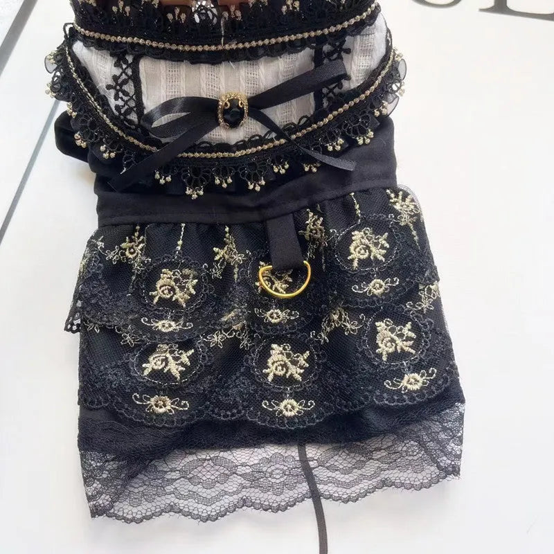 Golden layered gothic-style skirt for a small dog or cat on a mannequin, showing princess cut.