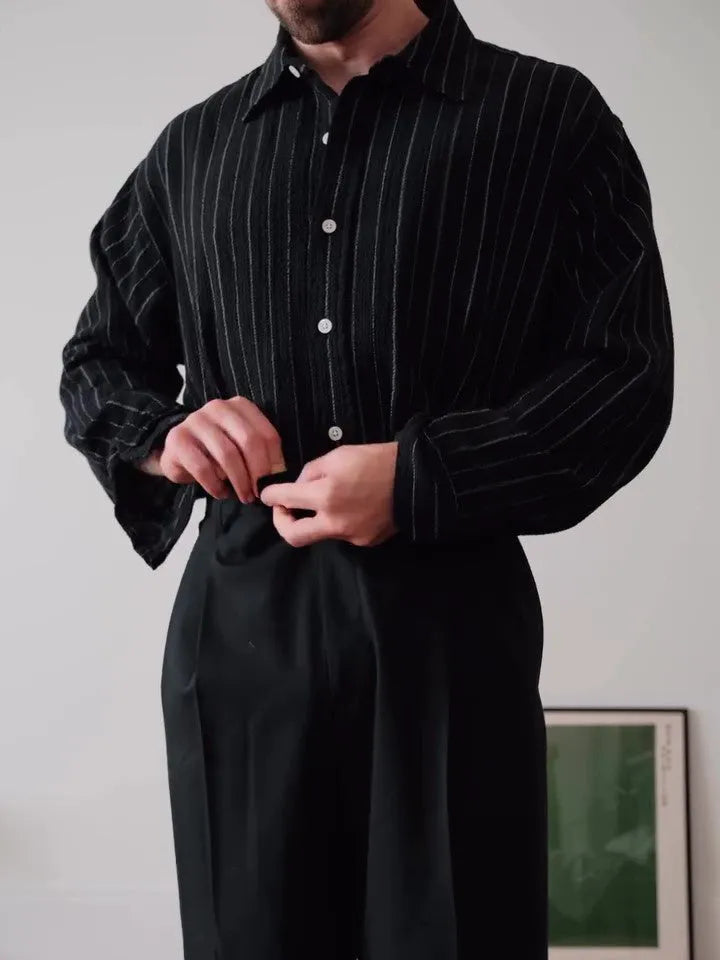 Black pinstripe polyester button-down shirt with regular fit and long sleeves