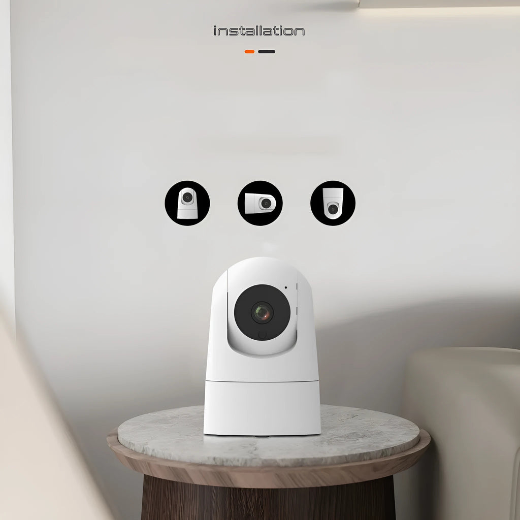White indoor security camera with wide-angle lens on a shelf, showing compact 80x80x115mm size.
