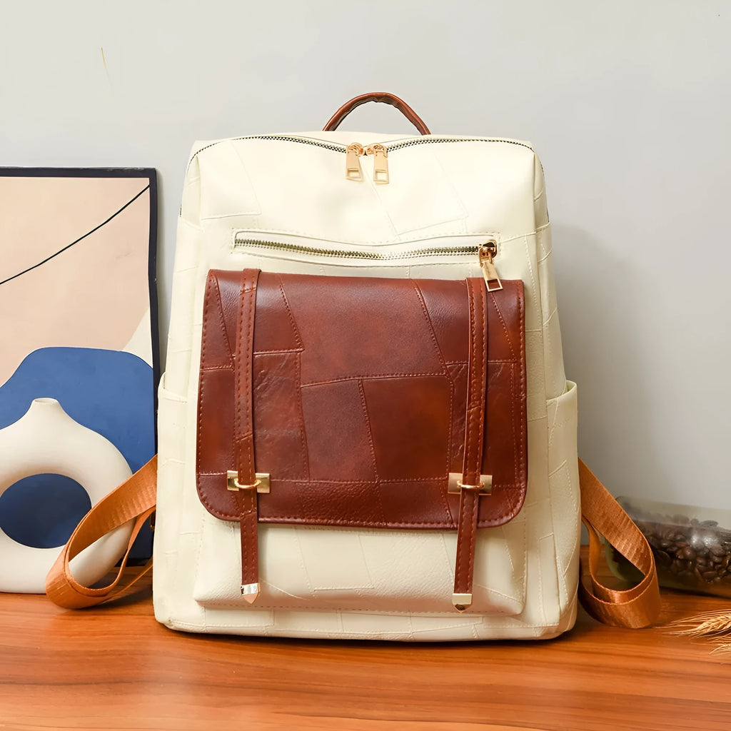 Retro style women's backpack in PU leather with waterproof exterior and internal zipper change bag