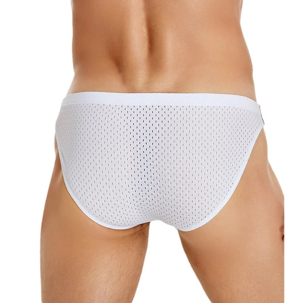 Men's solid colour low waist nylon mesh briefs on a white background