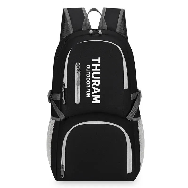 Dark blue folding outdoor backpack with straps, showing its large capacity and air pillow belt.