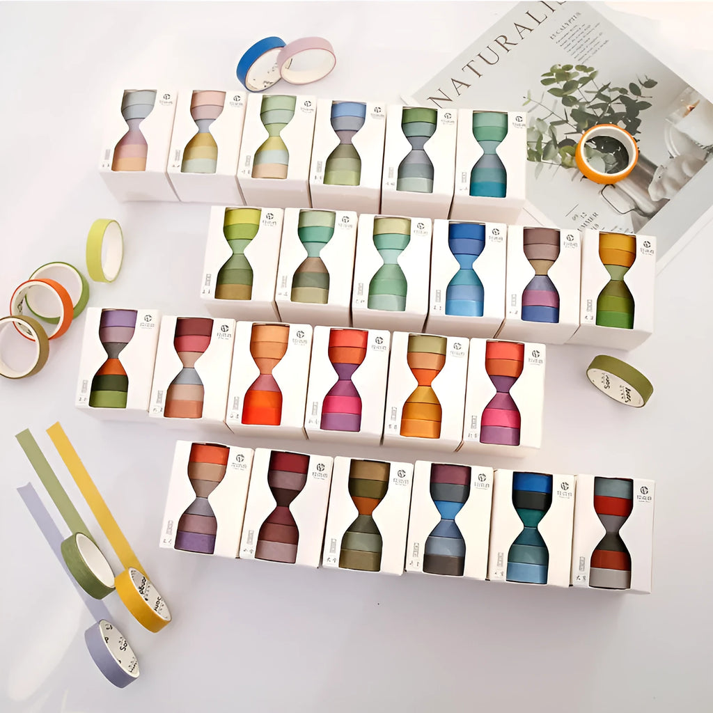 Six rolls of solid colour ledger tape labelled with solar term names, each 9mm wide, on a white background.