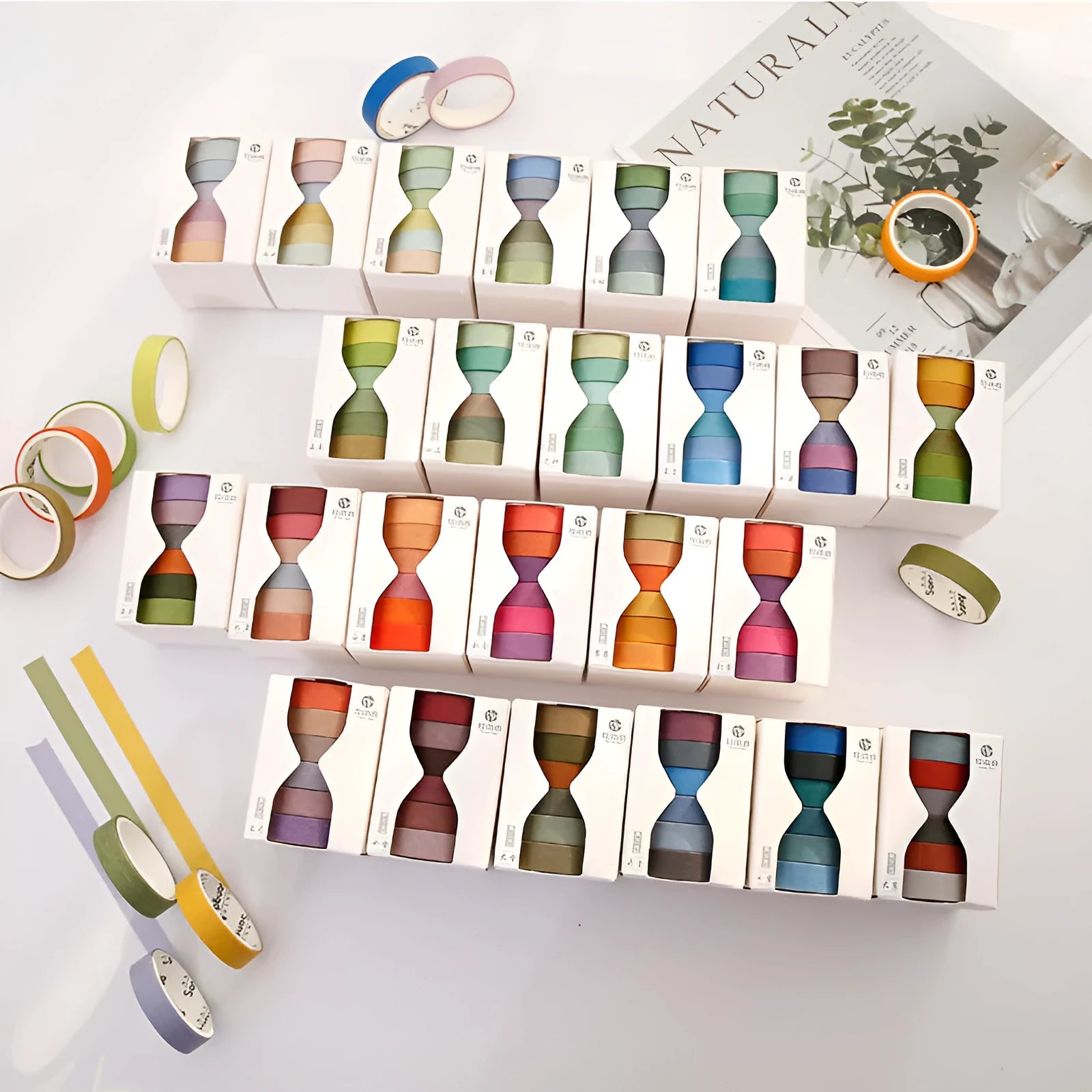 Six rolls of solid colour ledger tape labelled with solar term names, each 9mm wide, on a white background.