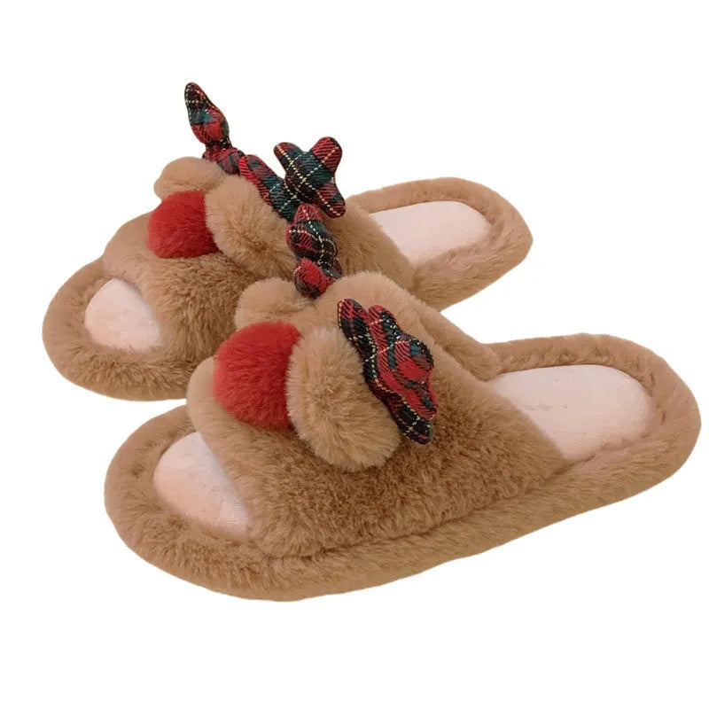 Brown women's slippers with a cartoon deer design, suede upper, and PVC sole.