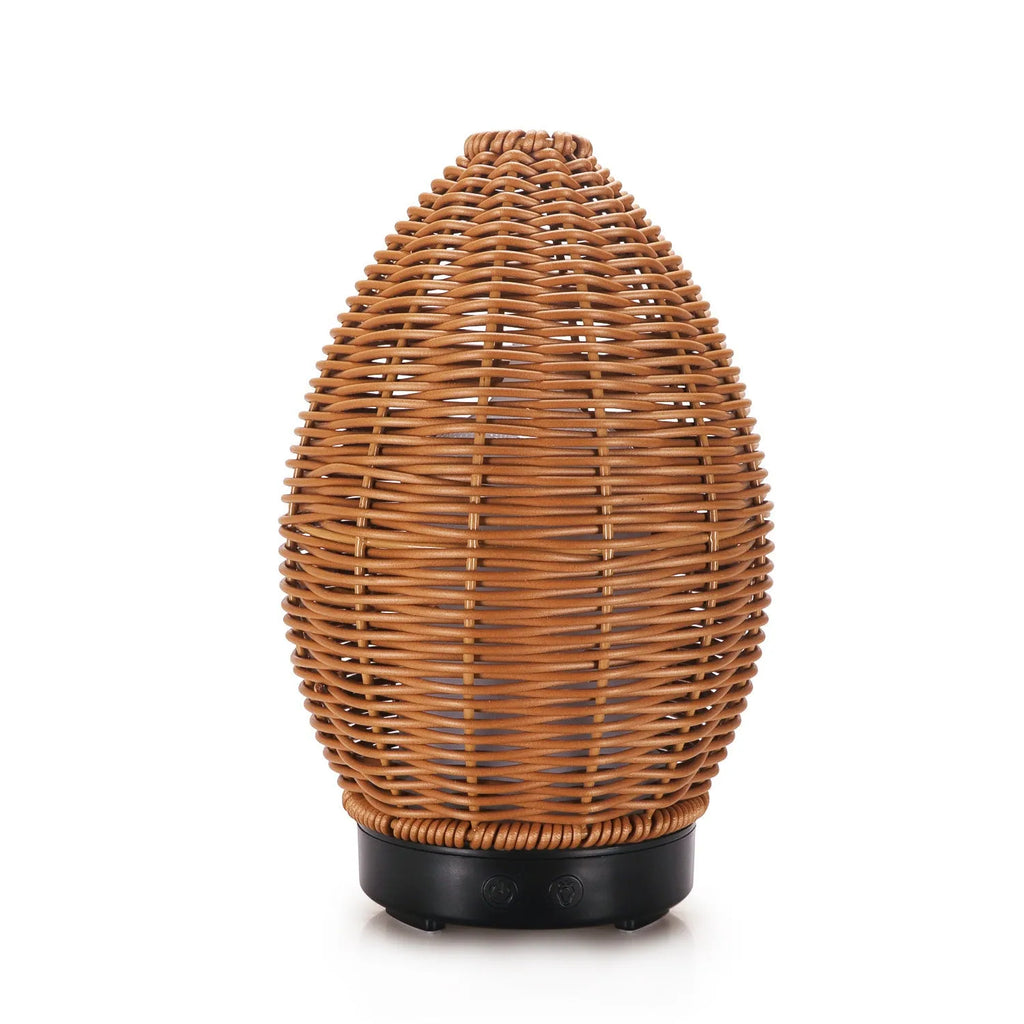 Hollow rattan aroma diffuser with light wood grain base and 100ml capacity for essential oils