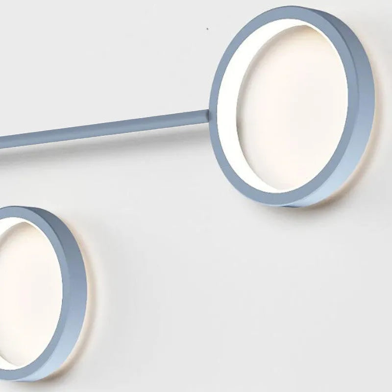 Contracted designer wall lamp with 6 heads in black iron and acrylic mounted on a bedroom wall