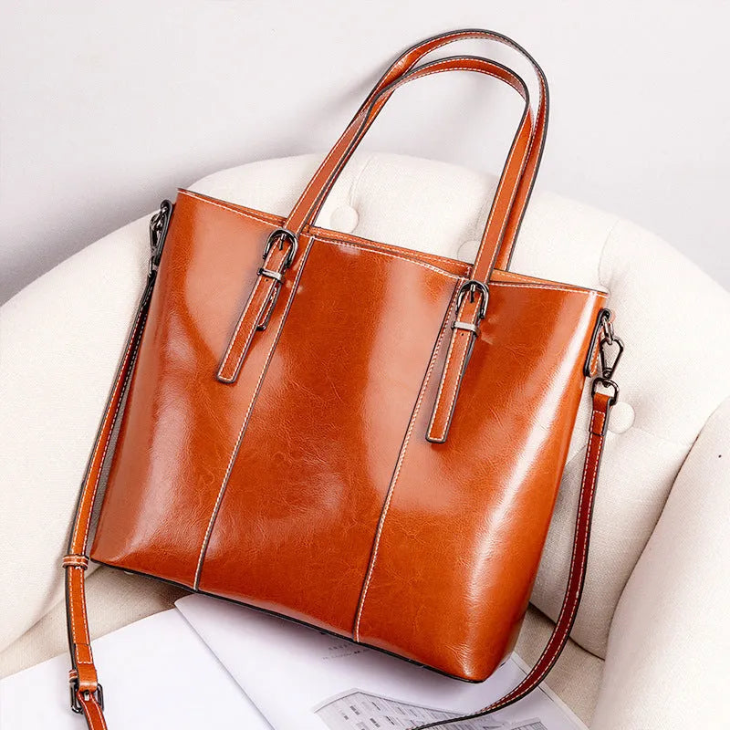 Brown genuine leather women's retro shoulder bag with three straps and multiple pockets