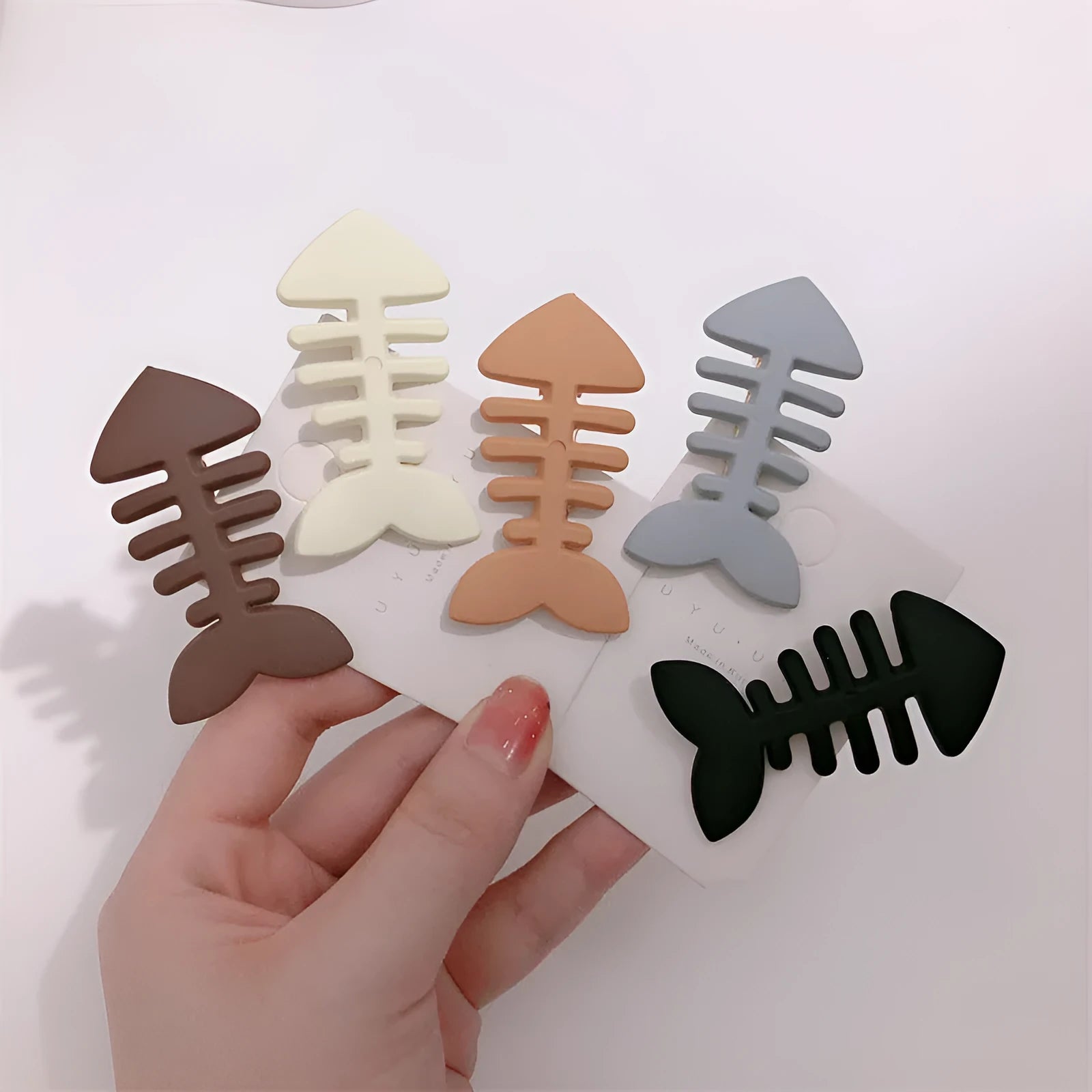 Minimalist fishbone pattern hair barrette with duckbill clip in a candy colour.