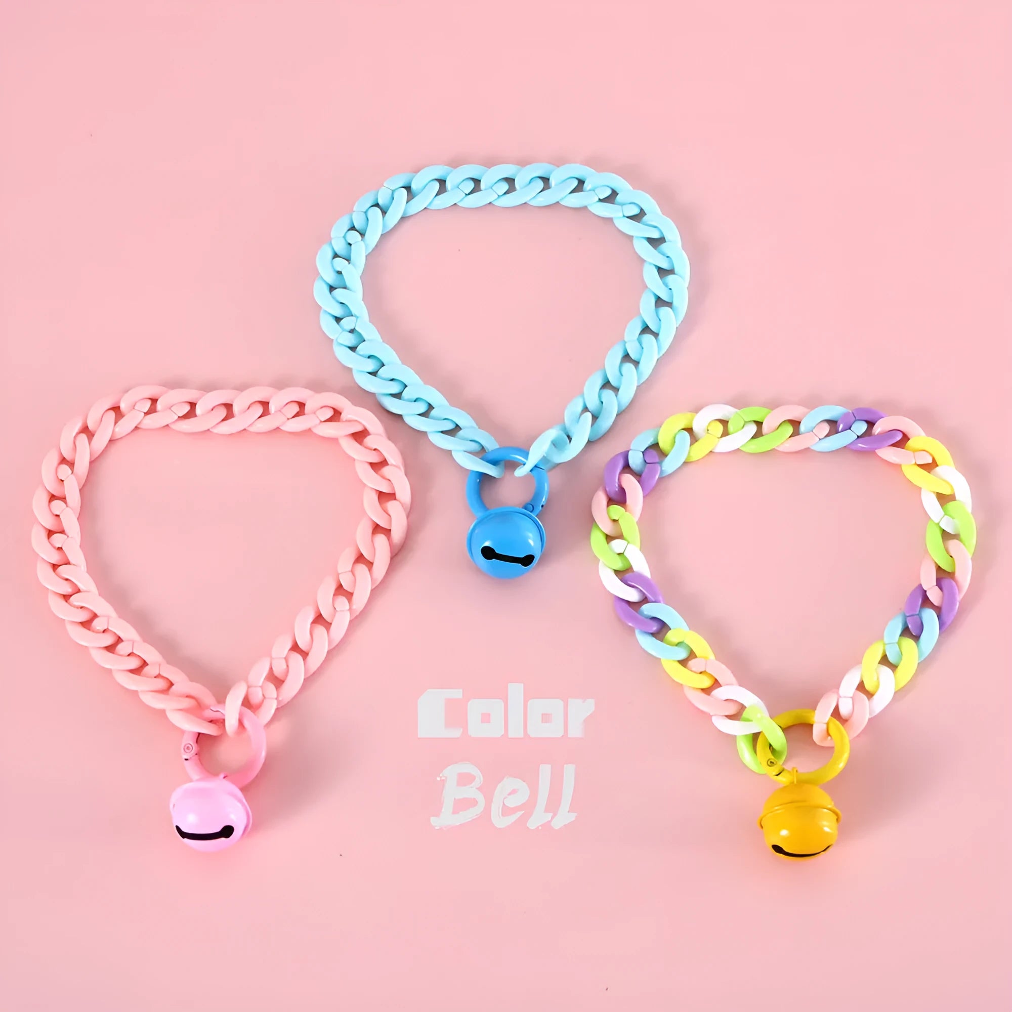 Soft plastic pet collar in pastel macaron candy colours with a chain-link design, shown in S and M sizes.
