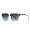 Man wearing black square frame sunglasses with polarised UV400 lenses, showcasing the box style design.