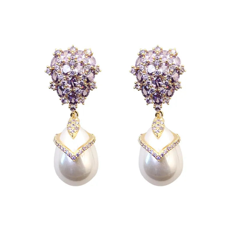 Women's drop-shaped pearl and zircon earrings with 18K gold plating in three colour variations.