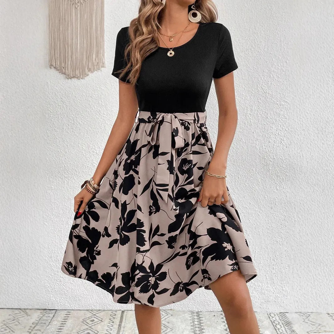 Women's khaki A-line dress with floral printing and a shoulder strap detail