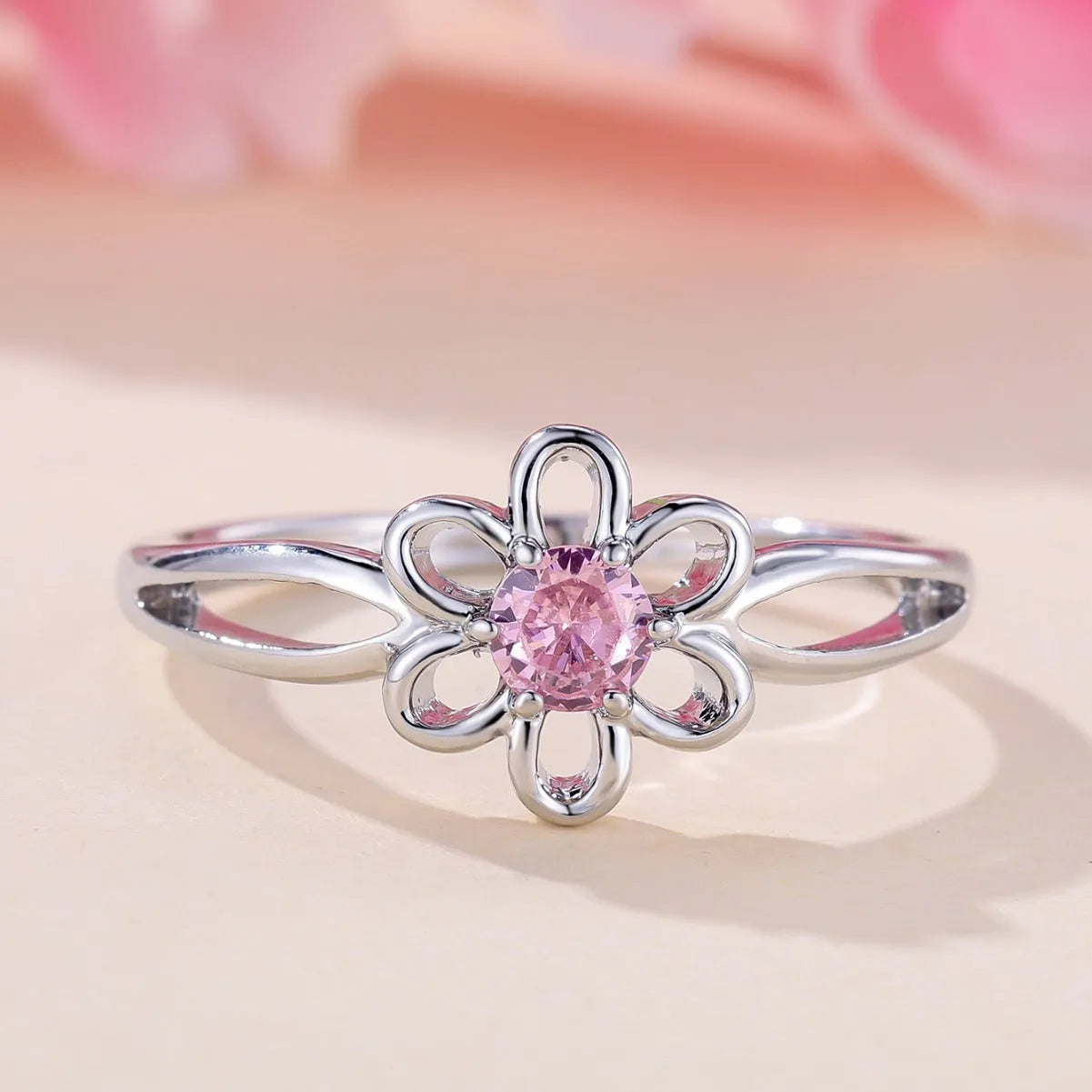 Lady's copper flower hollowed ring with electroplating finish in platinum pink diamond