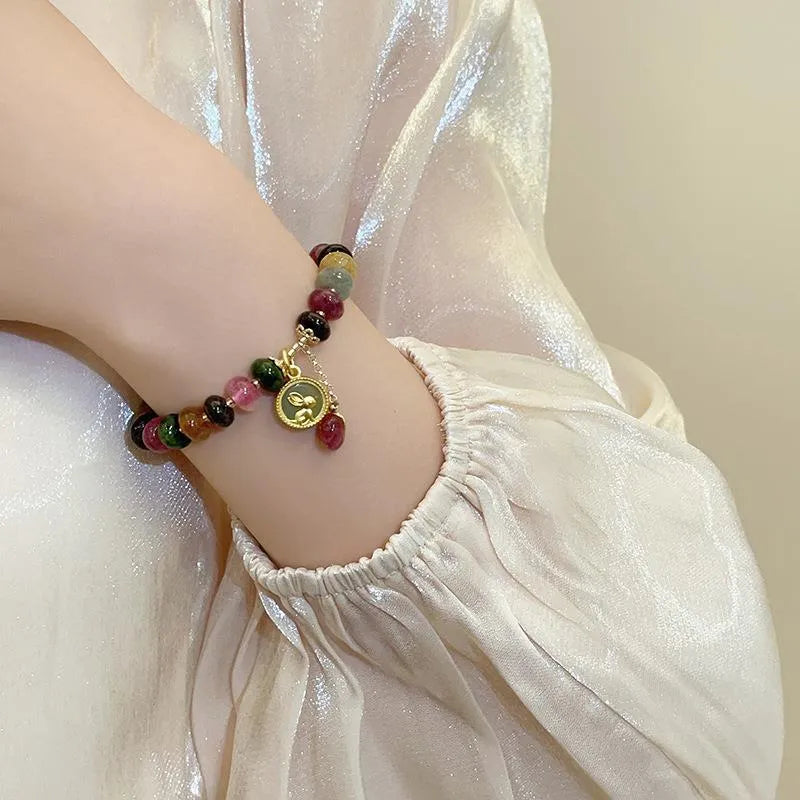 Handmade colourful tourmaline bracelet with rabbit pendant and round abacus beads