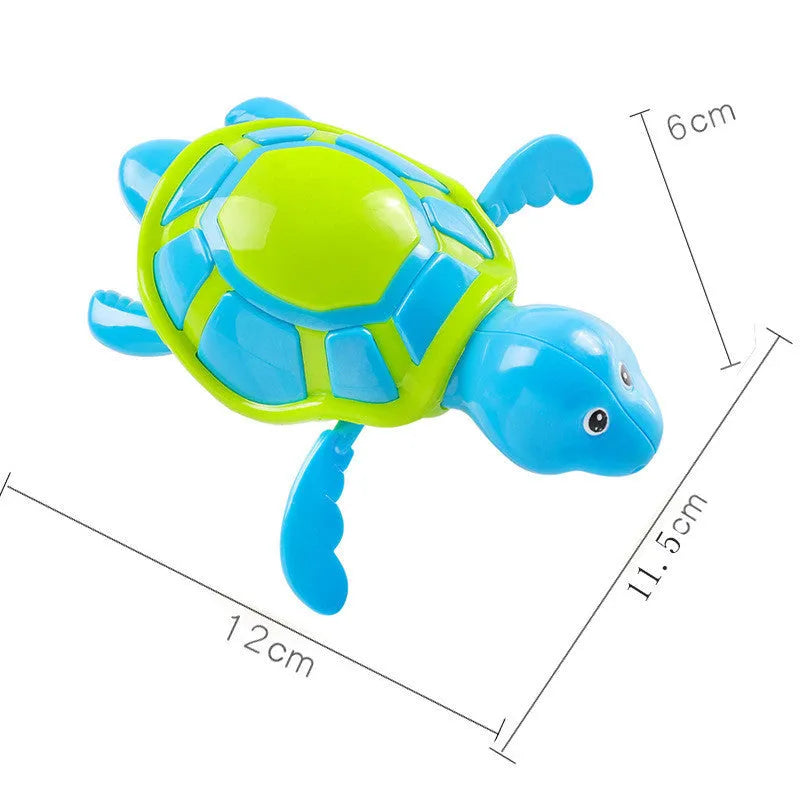 Plastic swimming turtle bath toy with brain game element for water play