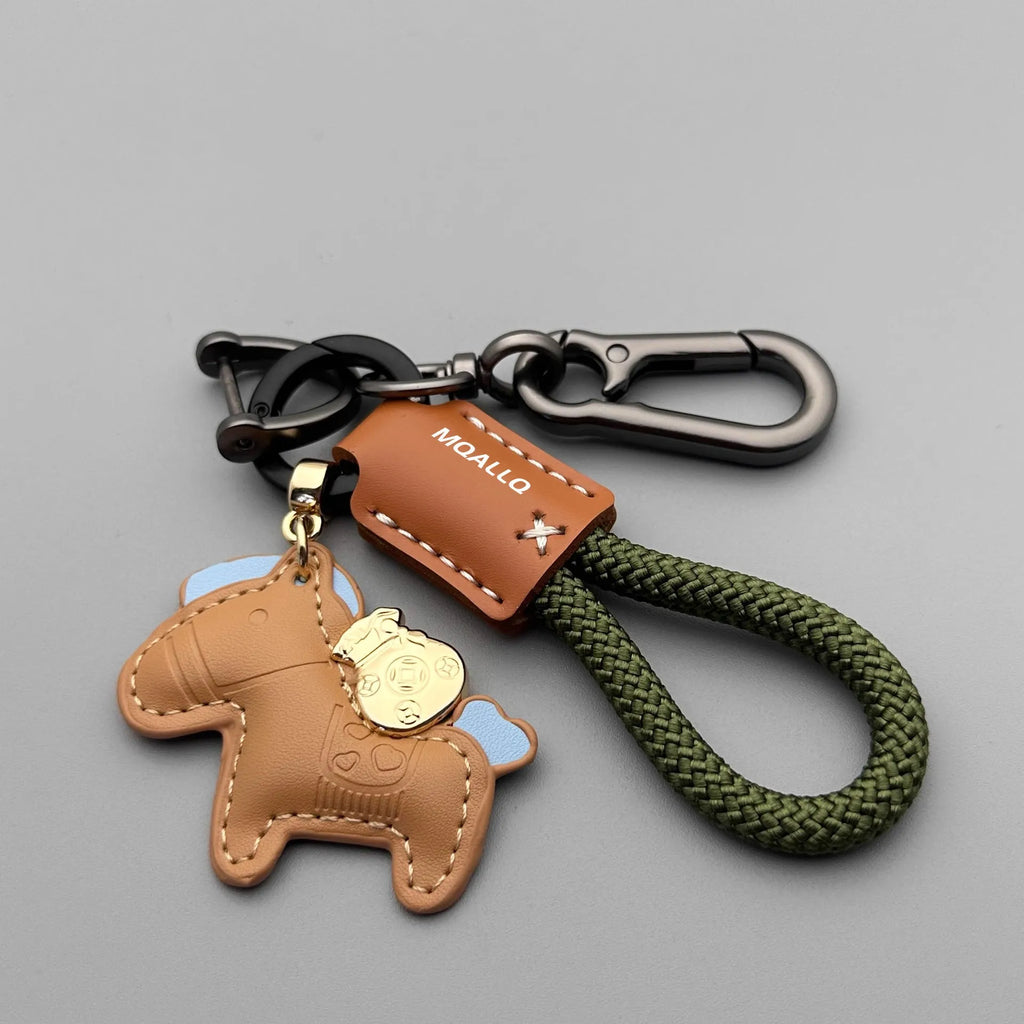 Handmade cowhide car key ring pendant with zinc alloy pony belt buckle on a colourful flanelle rope.