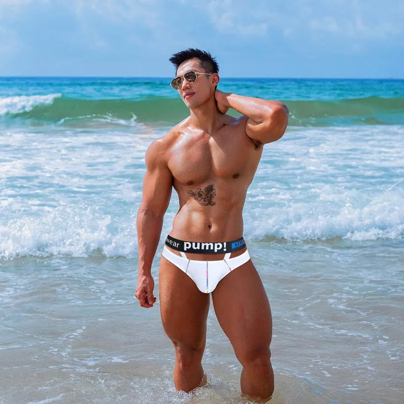 Men's solid colour modal low-waist briefs in black, laid flat.