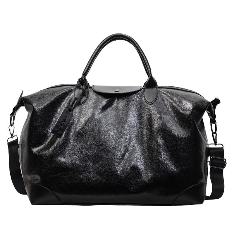 36-55L capacity hand-carry travel bag in black or silver with PU construction and polyester lining