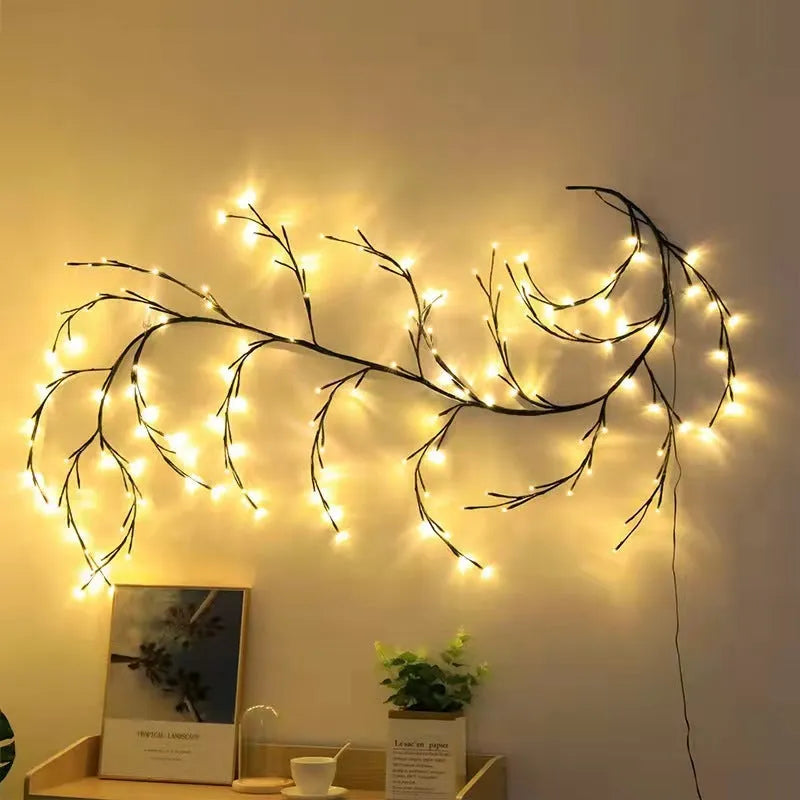 Flexible LED willow vine garland with warm white lights shaped into decorative curve