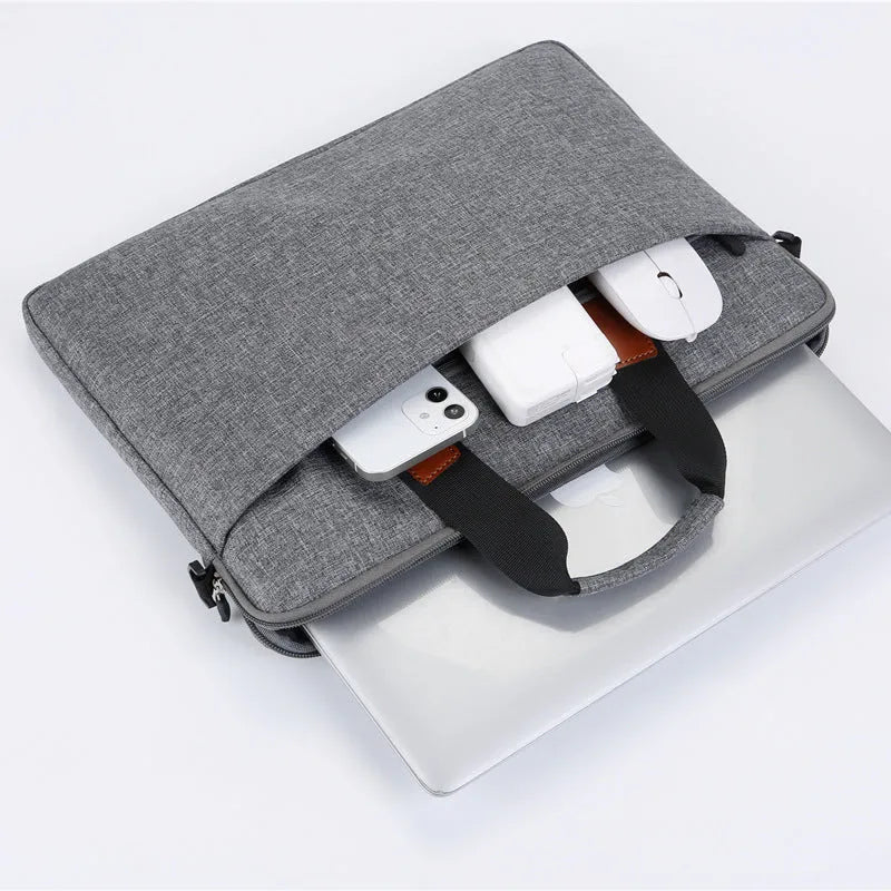 One-shoulder laptop bag in Oxford cloth, available in black, grey, pink, purple, and blue for 12 to 15.6 inch laptops.