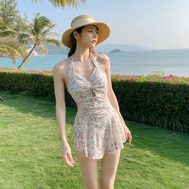Women's solid colour one-piece swimsuit in avocado green with a backless and conservative style design.