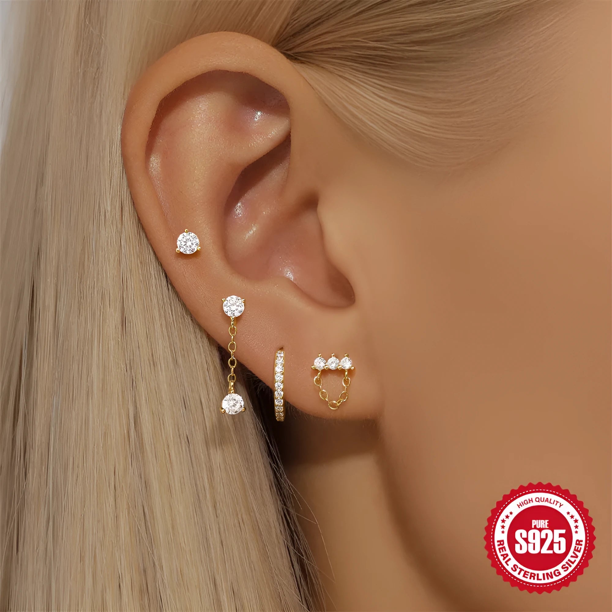S925 sterling silver clover petal earrings with gold electroplating in a simple geometric design.