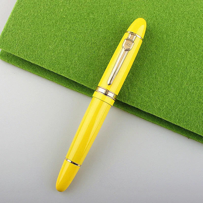 Metal ball pen with pearl round beads and black gold clip on white background