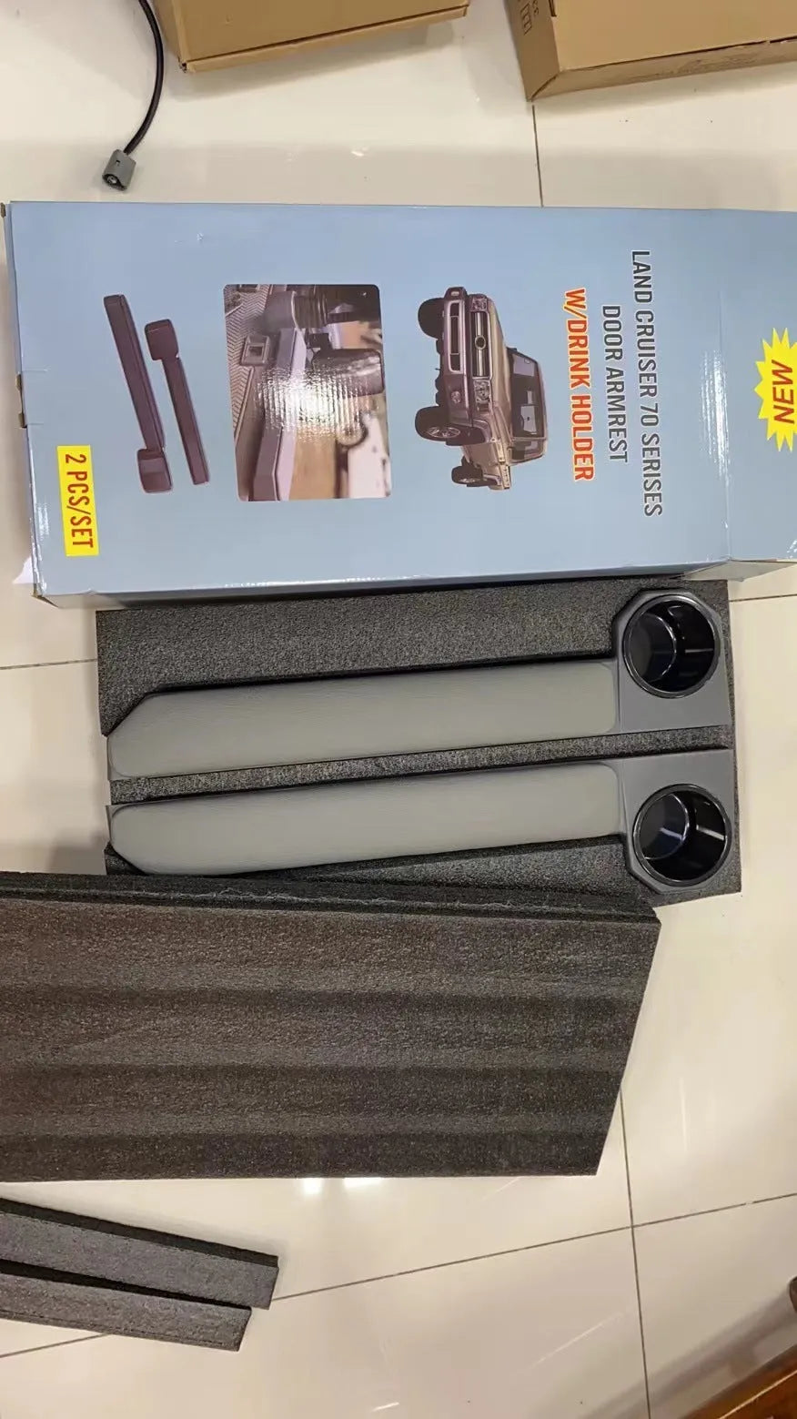 Grey car door armrest set with magnetic attachment for vehicle interior installation