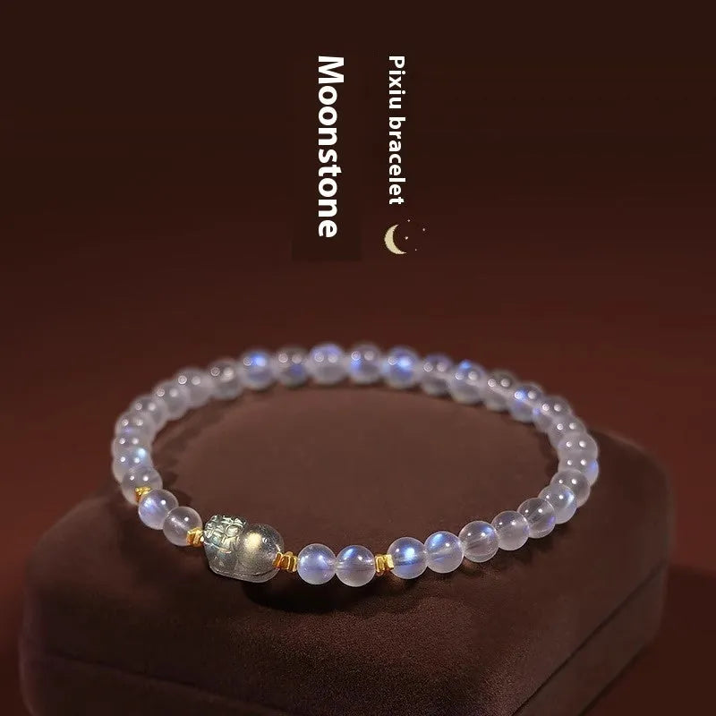 Women's moonstone bracelet with zodiac animal modelling in a national style.