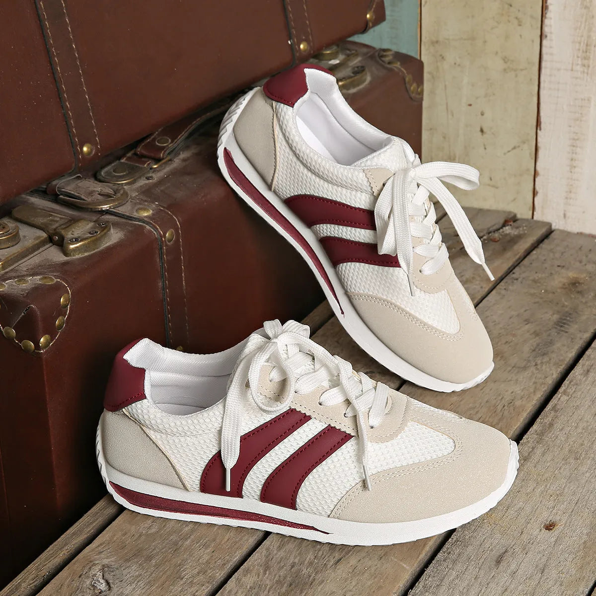 Wine red Cortez Retro sneakers with cross strap design and mesh lining