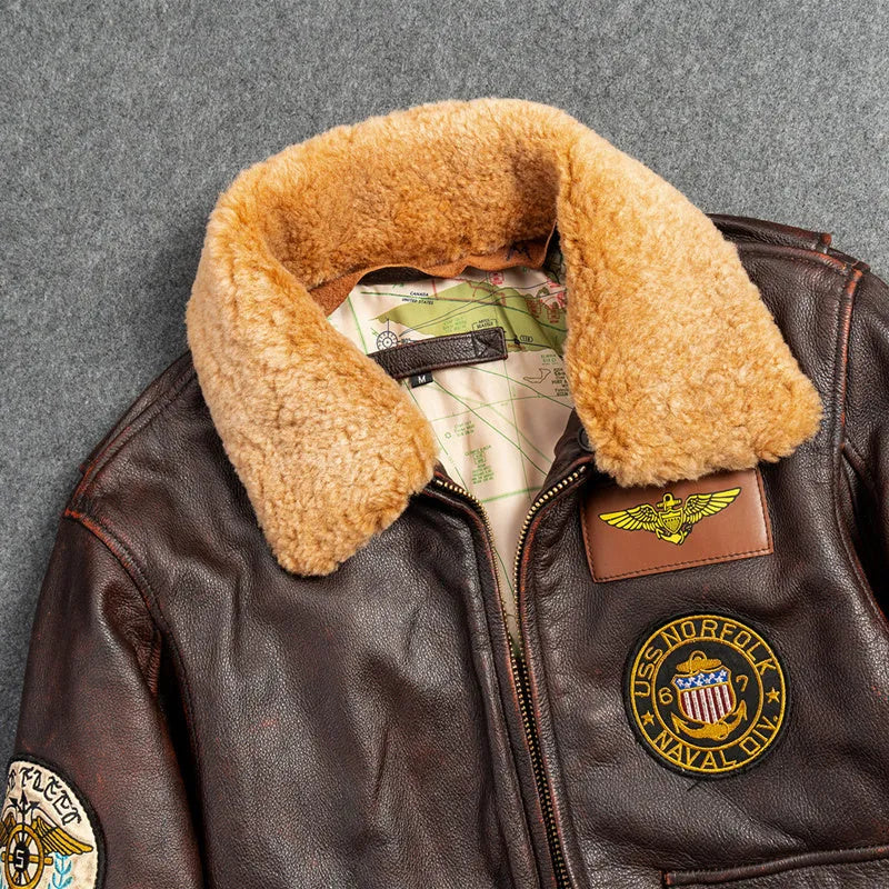 Men's genuine top layer cowhide leather motorcycle jacket in dark brown, with detachable collar and ribbed hem, shown front view