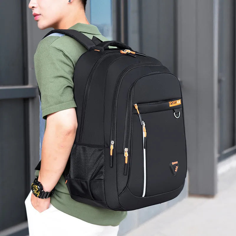 Men's Oxford cloth schoolbag in red with letter pattern design showing air pillow belt system