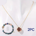 Natural stone beaded necklace and bracelet set with assorted crystals and silver clasps on a grey background