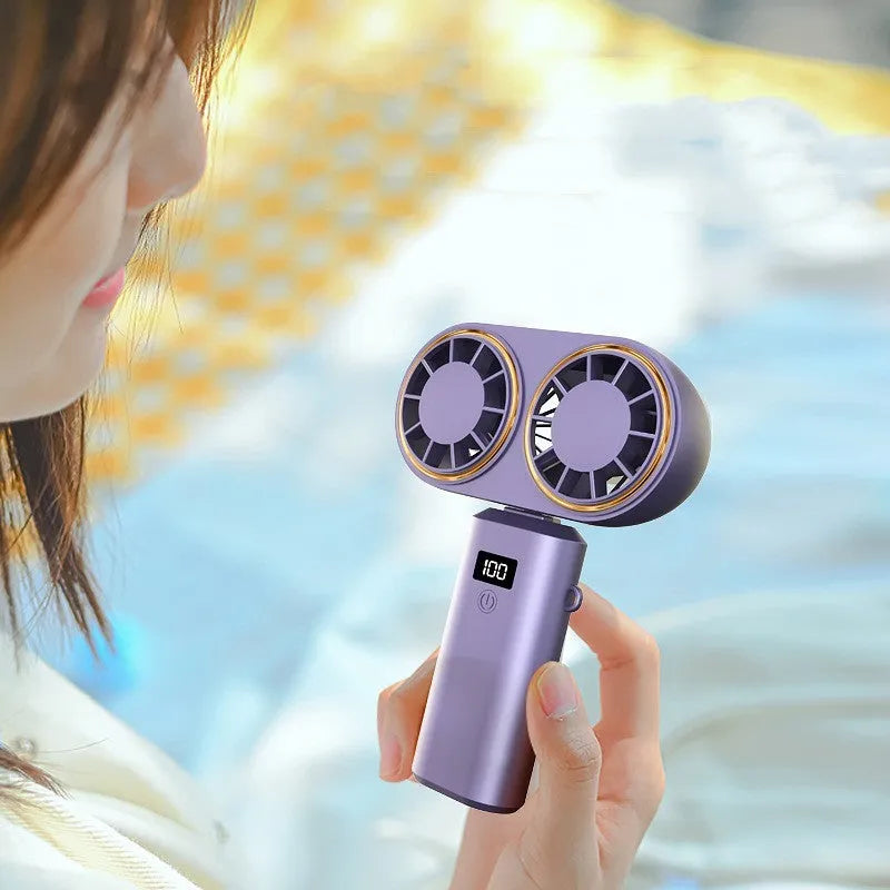 Folding USB handheld mini fan with digital display screen in milky white colour showing 5-speed settings