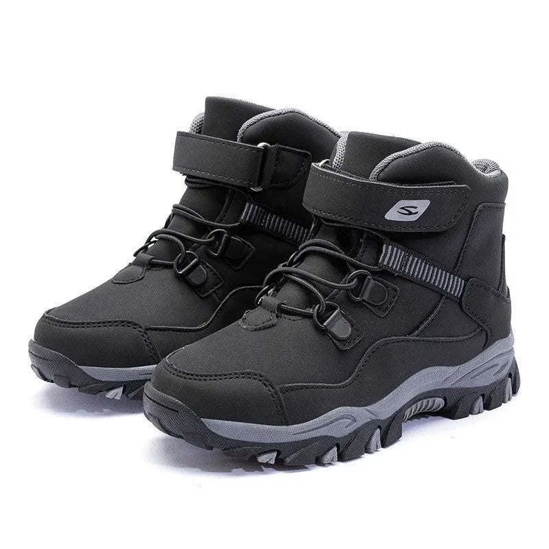 Hobby Bear children's black waterproof Martin boots with velcro buckle on a rubber sole.