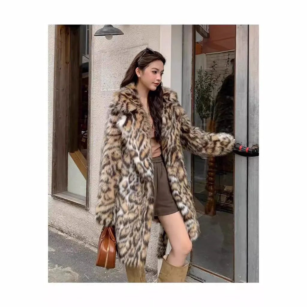 A long faux fur coat with a fox fur-style collar, shown in a street fashion context.