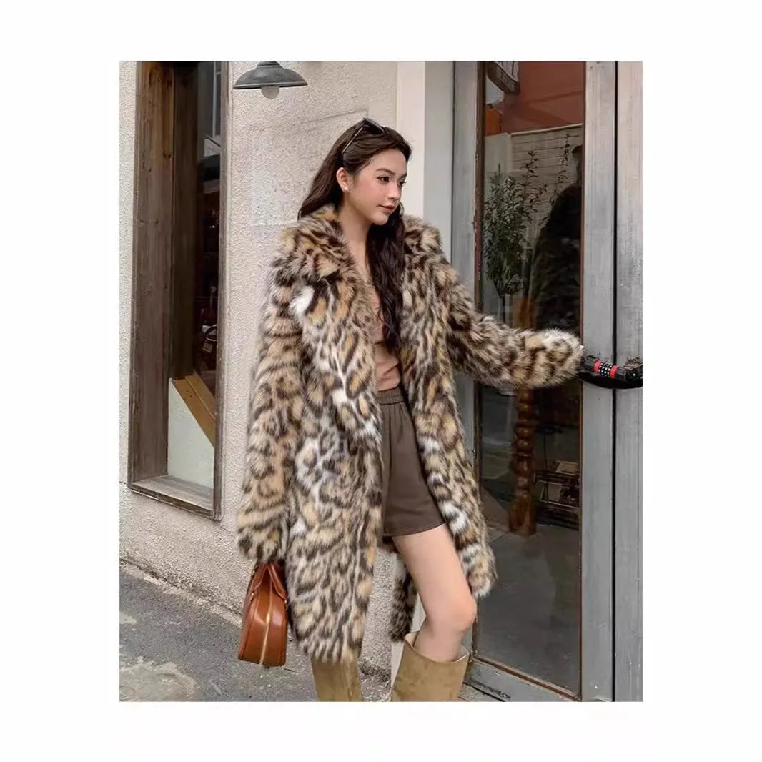 A long faux fur coat with a fox fur-style collar, shown in a street fashion context.