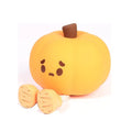 Soft silicone pumpkin-shaped night light with dimmable touch control on bedside table