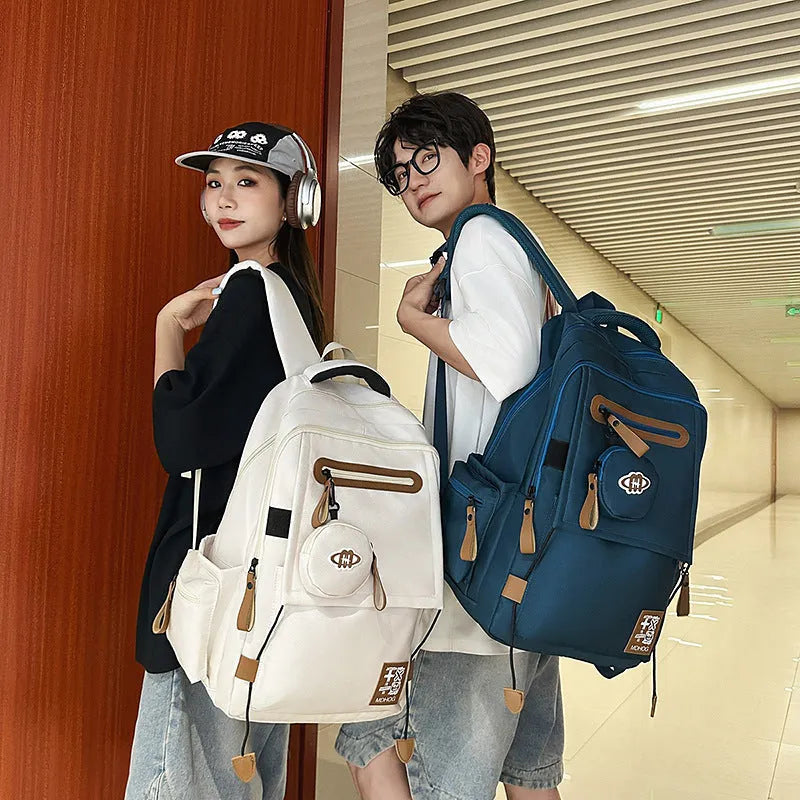 Large waterproof nylon travel backpack with contrast stitching in various colour options