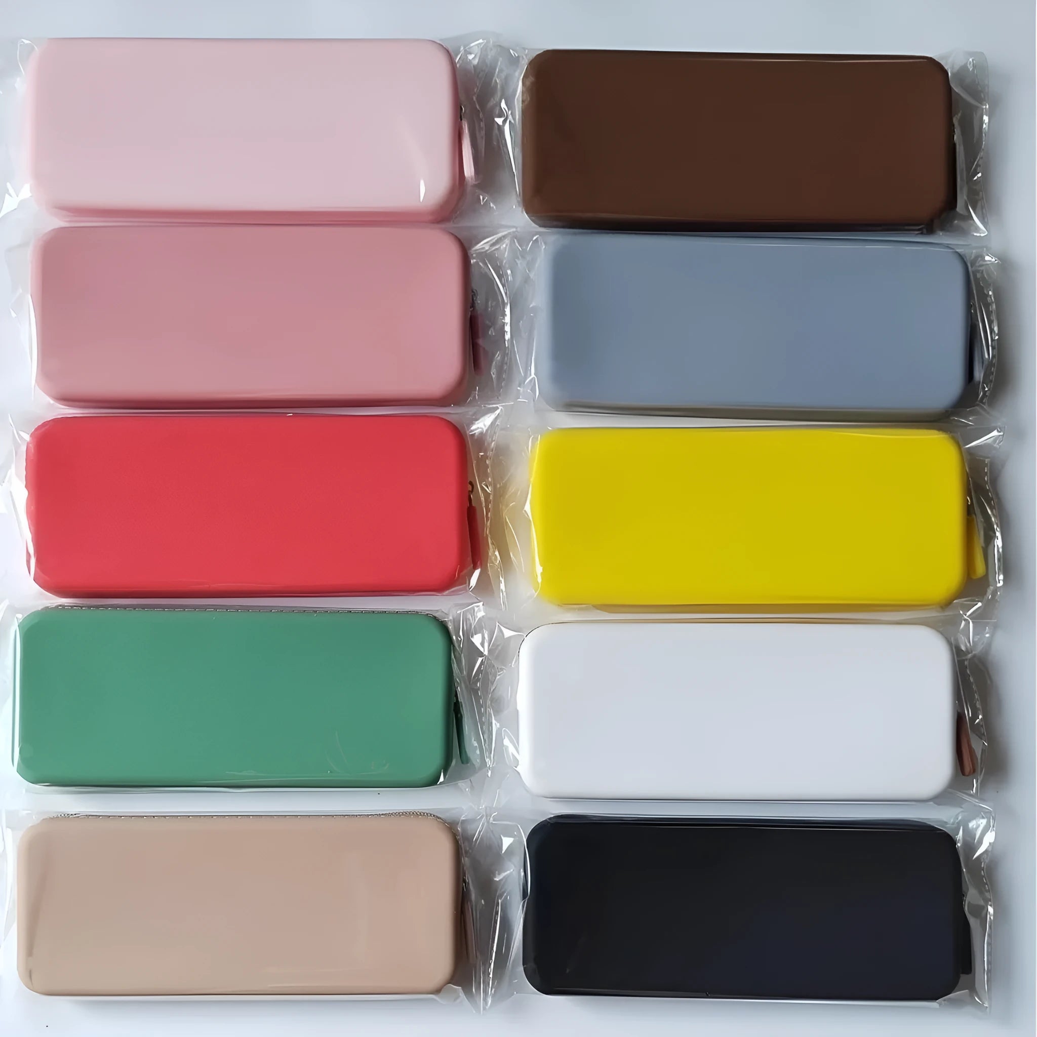 Silicone dustproof makeup brush storage bag in assorted colours showing compact size