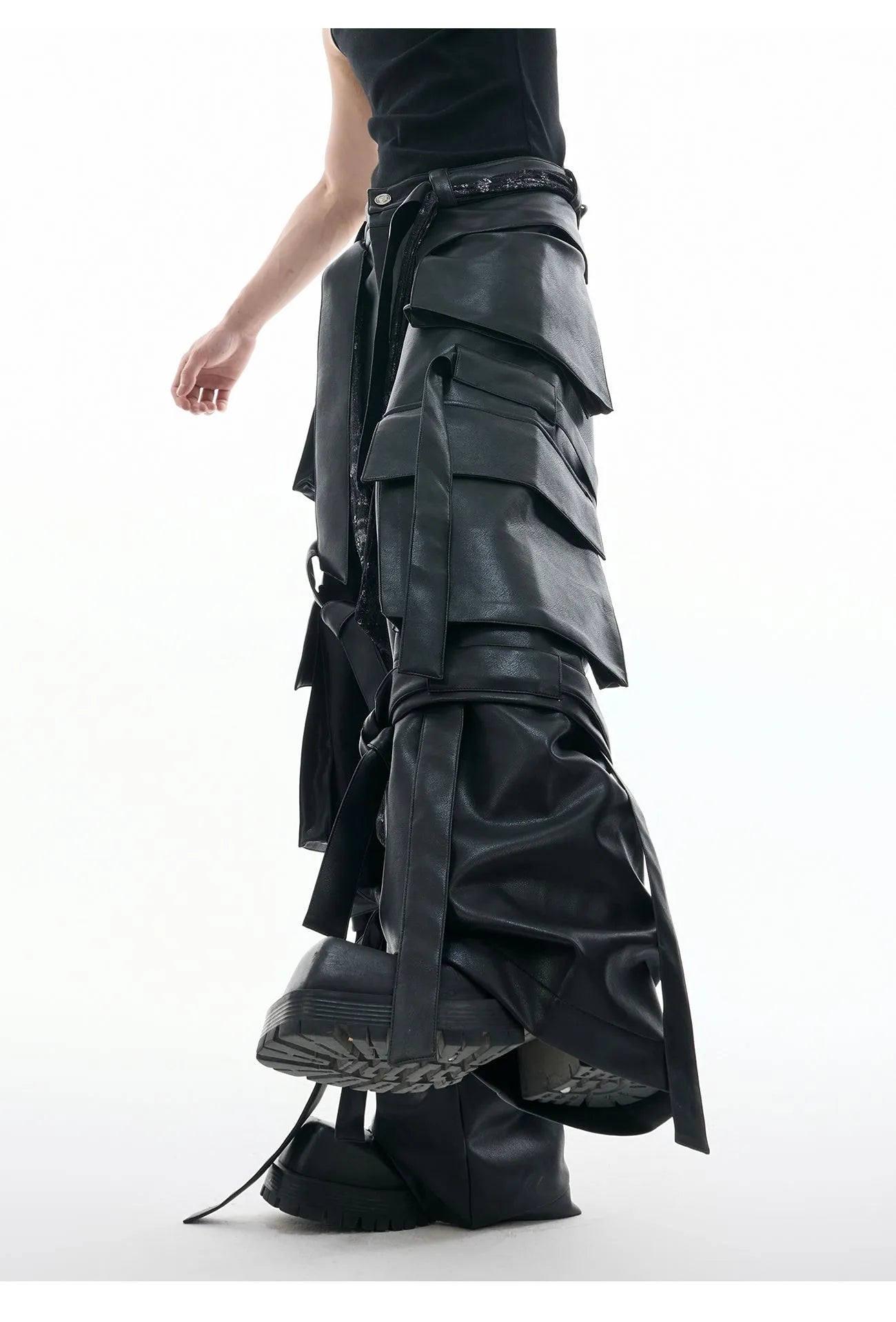Black loose-fit trousers with quilted stitching pattern and multiple pockets