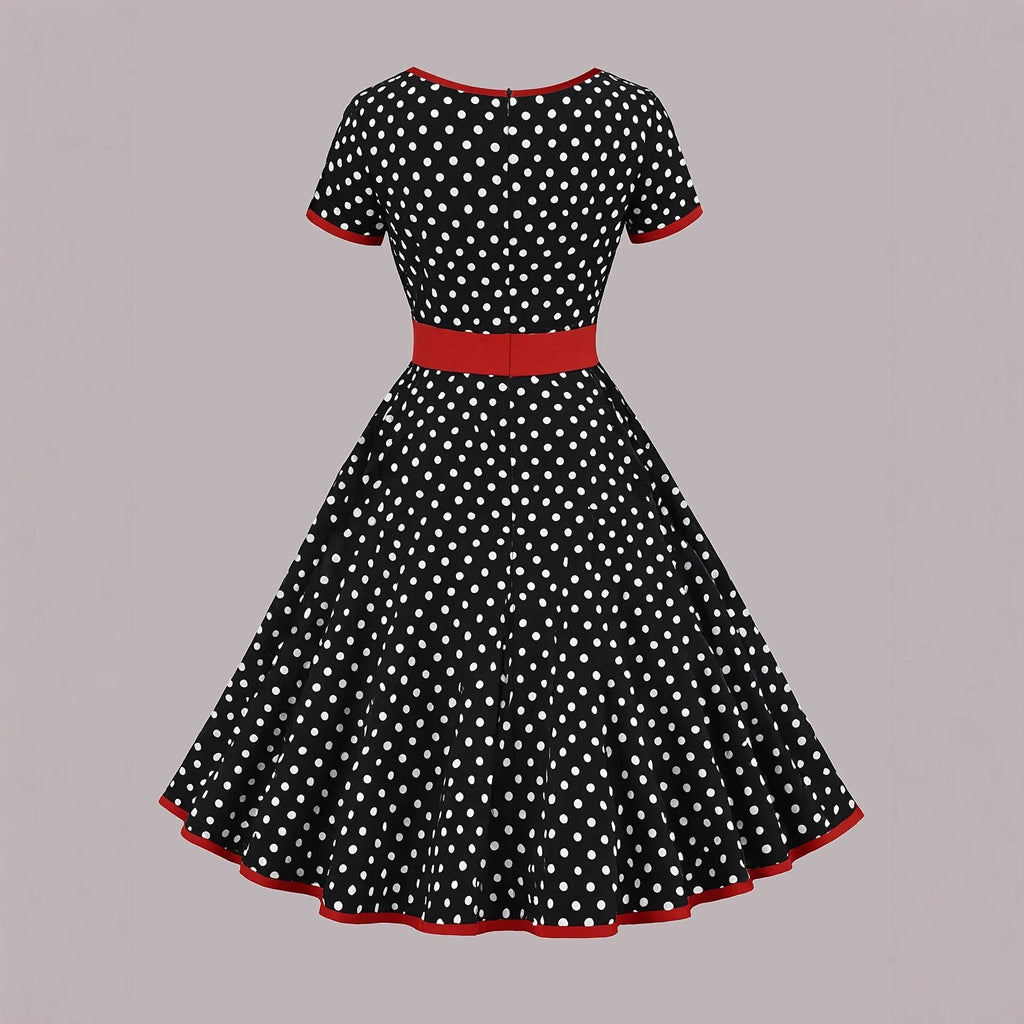 Multicolour polka dot dress with a square neckline, short sleeves, and a full pleated skirt with a back zip.