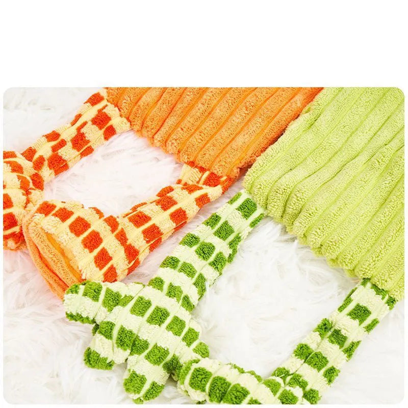Green or orange durable plush dog toy with squeaker for aggressive chewers