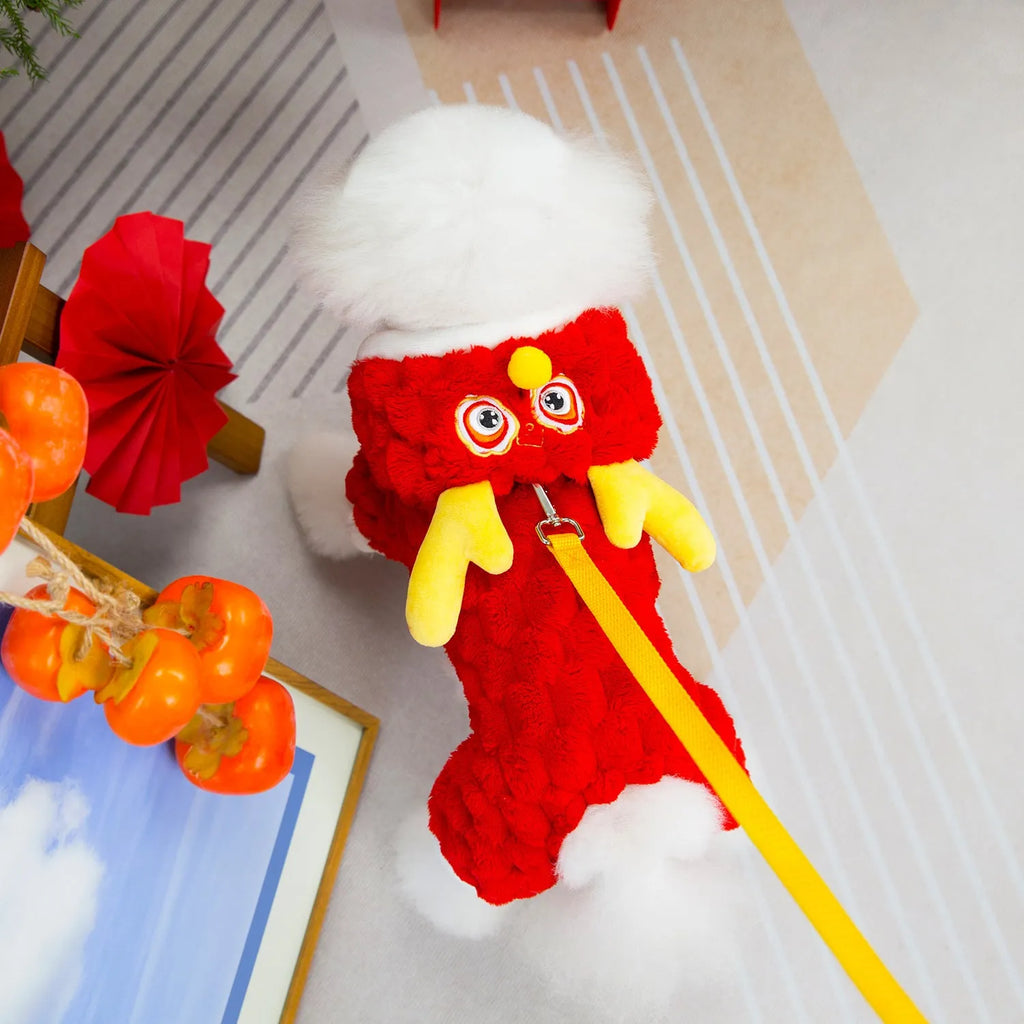 Red velvet dog jacket with cartoon dragon design for festive pet wear